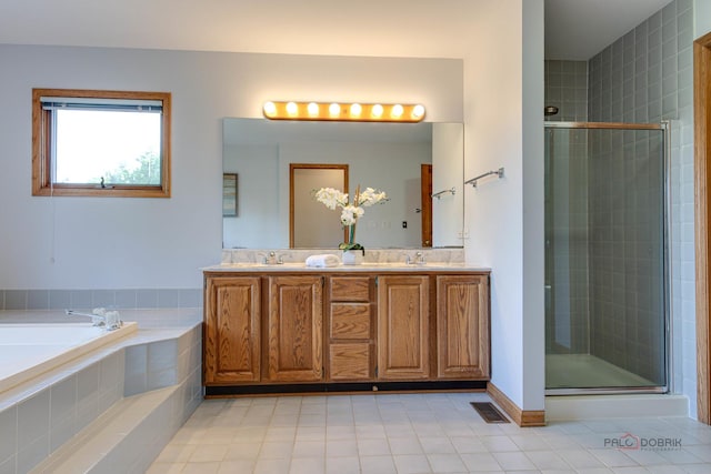 337 S Harrison Ct, Palatine, IL 60067 - bathroom with tile patterned floors, a shower stall, a garden tub, and double vanity