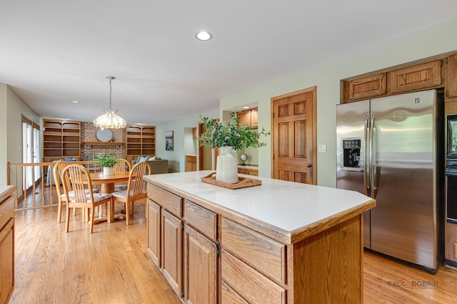 337 S Harrison Ct, Palatine, IL 60067 - kitchen featuring stainless steel fridge with ice dispenser, light wood-style floors, a center island, light countertops, and recessed lighting