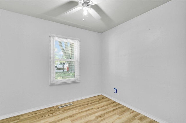 1903 Alton Dr, Champaign, IL 61821 - unfurnished room featuring light wood finished floors, baseboards, and ceiling fan
