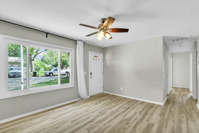 1903 Alton Dr, Champaign, IL 61821 - unfurnished room featuring light wood-style flooring, baseboards, and a ceiling fan