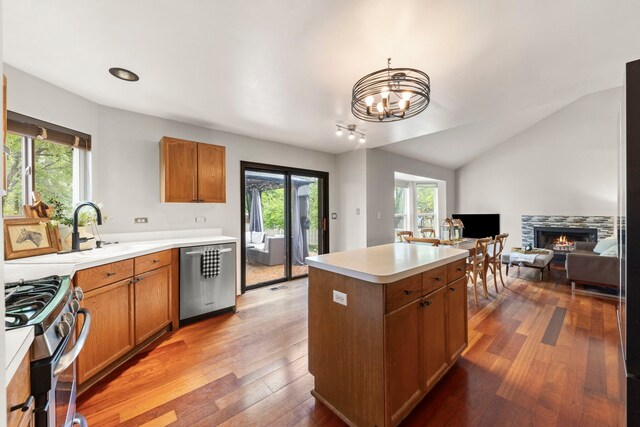 2990 Melbourne Ln, Lake In The Hills, IL 60156 - kitchen featuring appliances with stainless steel finishes, plenty of natural light, open floor plan, hardwood / wood-style flooring, and vaulted ceiling