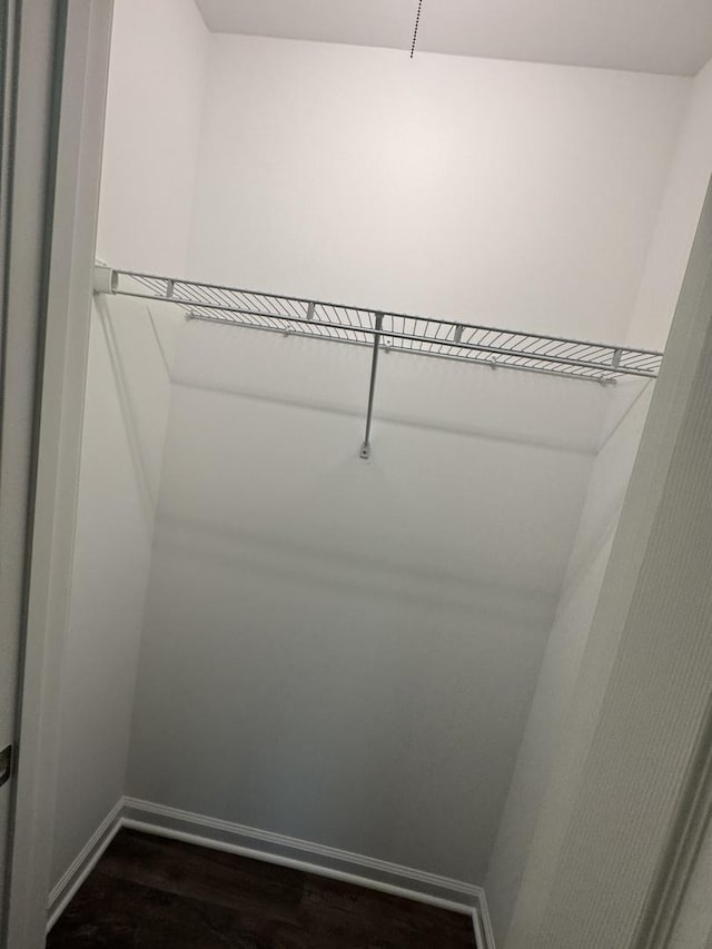 734 Keller Dr, Dixon, IL 61021 - spacious closet featuring dark wood-type flooring