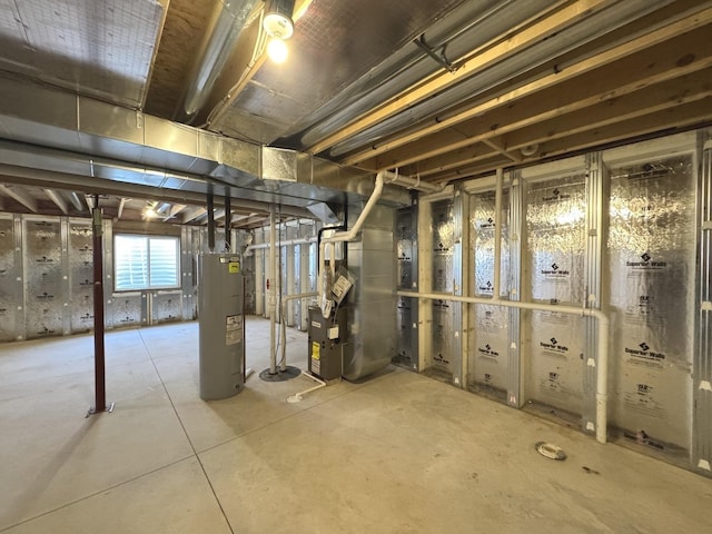 734 Keller Dr, Dixon, IL 61021 - basement featuring electric water heater and heating unit