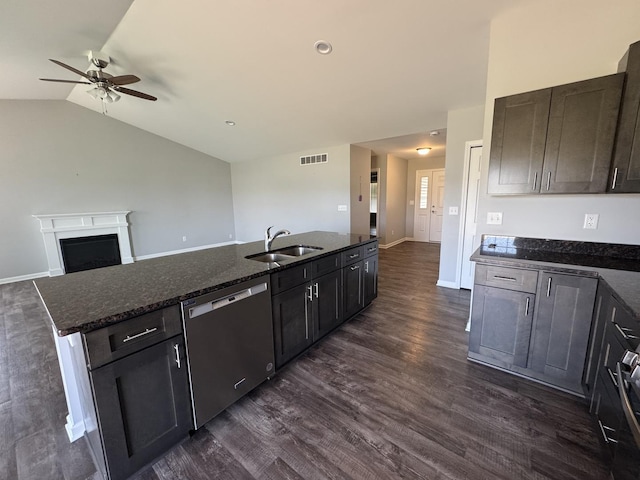 734 Keller Dr, Dixon, IL 61021 - kitchen with dishwasher, a sink, a ceiling fan, open floor plan, and dark wood finished floors