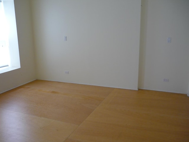 1926 W Grand Ave, Chicago, IL 60622 - empty room featuring light wood-style floors