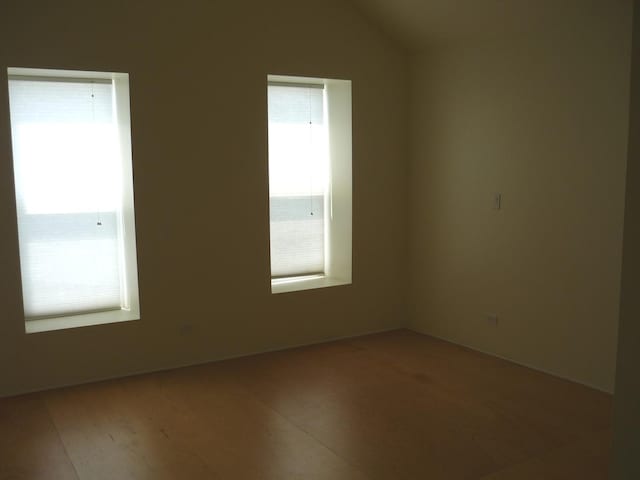 1926 W Grand Ave, Chicago, IL 60622 - empty room with plenty of natural light and lofted ceiling