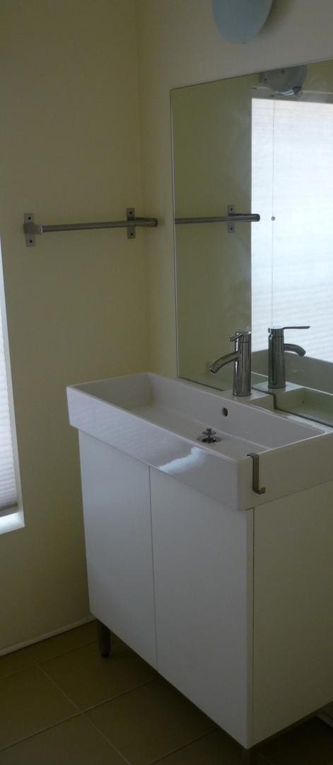 1926 W Grand Ave, Chicago, IL 60622 - bathroom with tile patterned flooring and vanity