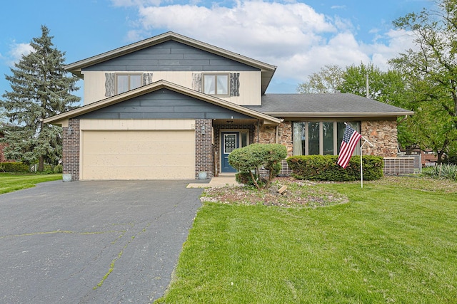 14417 Linder Ave, Midlothian, IL 60445 - view of front of property featuring a front lawn, driveway, and brick siding