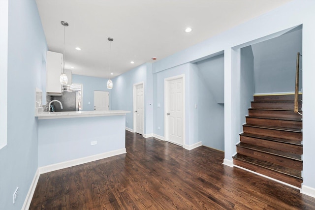 6728 S Sangamon St, Chicago, IL 60621 - unfurnished living room featuring dark wood-type flooring, stairway, recessed lighting, and baseboards