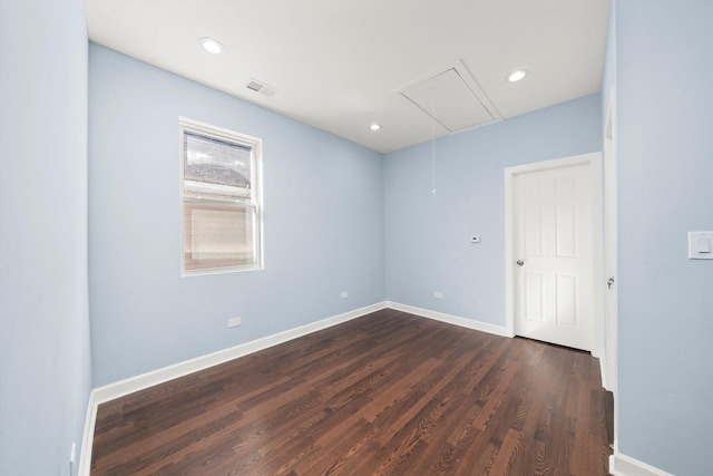 6728 S Sangamon St, Chicago, IL 60621 - unfurnished room featuring attic access, dark wood-style floors, baseboards, and recessed lighting
