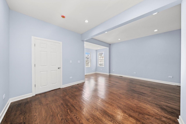 6728 S Sangamon St, Chicago, IL 60621 - unfurnished room featuring wood finished floors, baseboards, recessed lighting, and beamed ceiling