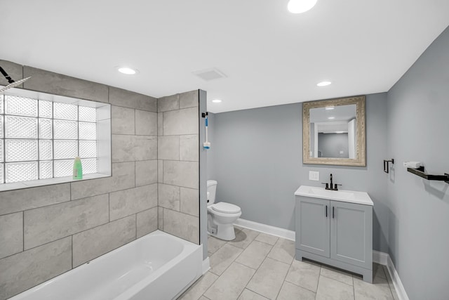 8623 S Wallace St, Chicago, IL 60620 - bathroom featuring baseboards, toilet, vanity, recessed lighting, and tile patterned floors