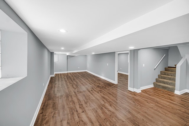 8623 S Wallace St, Chicago, IL 60620 - finished below grade area with wood finished floors, baseboards, stairs, and recessed lighting
