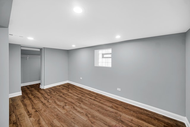 8623 S Wallace St, Chicago, IL 60620 - unfurnished bedroom featuring baseboards, dark wood-style floors, a closet, and recessed lighting