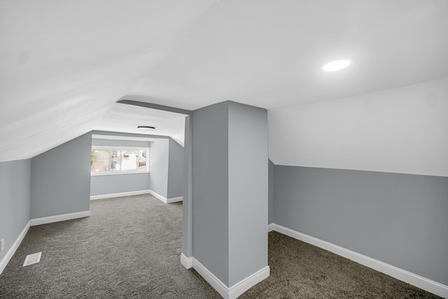 8623 S Wallace St, Chicago, IL 60620 - additional living space featuring carpet flooring, vaulted ceiling, and baseboards