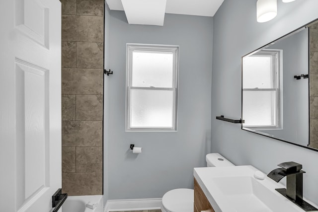 8623 S Wallace St, Chicago, IL 60620 - bathroom with toilet, vanity, and healthy amount of natural light