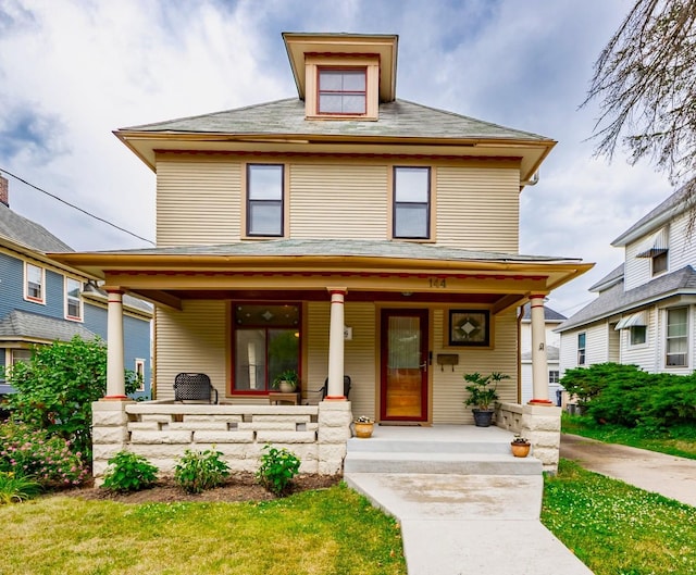 144 Hill Ave, Elgin, IL 60120 - american foursquare style home featuring covered porch