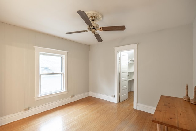 144 Hill Ave, Elgin, IL 60120 - spare room with light wood-style flooring and a ceiling fan