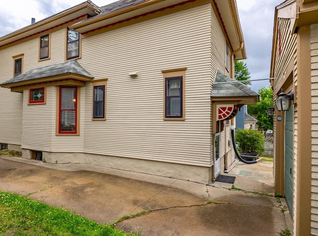 144 Hill Ave, Elgin, IL 60120 - view of side of home with roof with shingles
