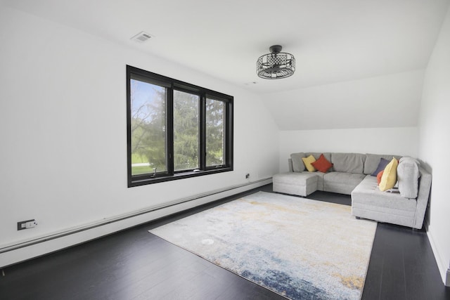 living room featuring baseboard heating, wood finished floors, and lofted ceiling