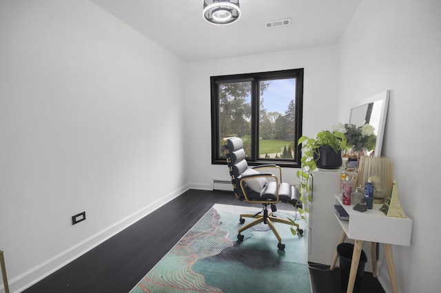 home office with wood finished floors, baseboards, and a baseboard heating unit