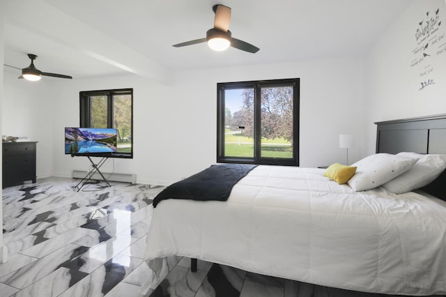 bedroom with baseboard heating, a ceiling fan, and baseboards