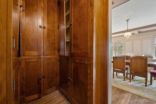 dining area view of wood finished floors