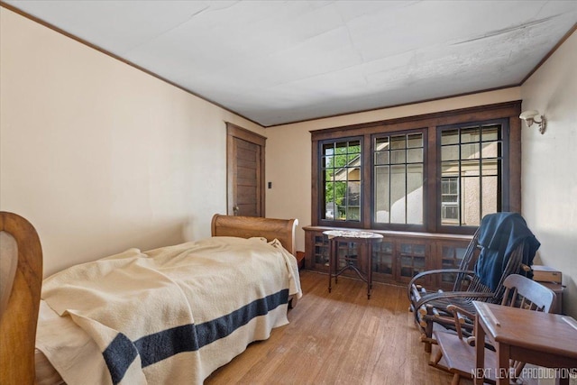bedroom featuring wood finished floors