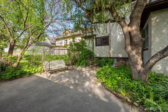 view of patio / terrace featuring fence
