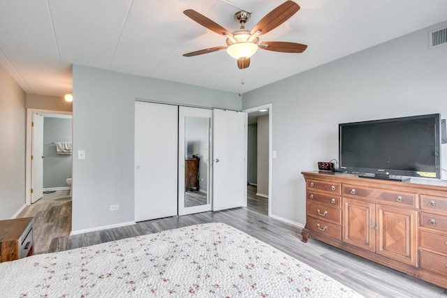 5S040 Pebblewood Ln Unit W503, Naperville, IL 60563 - bedroom with wood finished floors, a closet, baseboards, and a ceiling fan