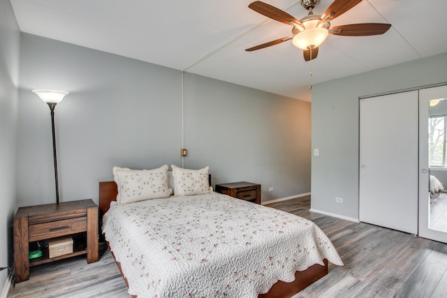 5S040 Pebblewood Ln Unit W503, Naperville, IL 60563 - bedroom with wood finished floors, baseboards, a closet, and ceiling fan