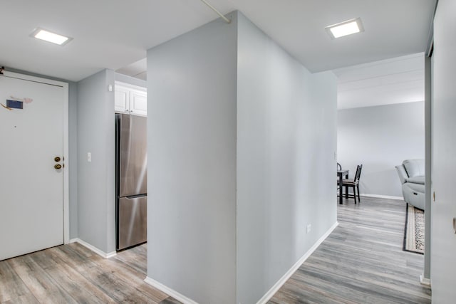 5S040 Pebblewood Ln Unit W503, Naperville, IL 60563 - corridor with light wood-style flooring and baseboards