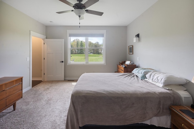 10499 E Shagbark Ln, Rochelle, IL 61068 - bedroom with carpet, baseboards, and ceiling fan