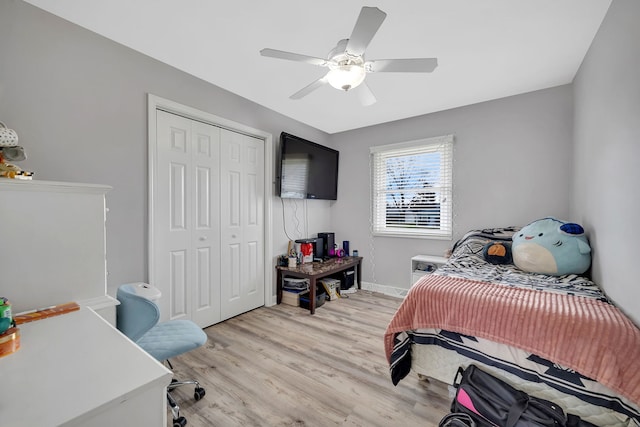 3019 Harris Dr, Joliet, IL 60431 - bedroom featuring a closet, light wood-style flooring, a ceiling fan, and baseboards