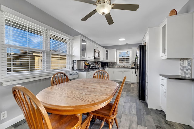3019 Harris Dr, Joliet, IL 60431 - dining room featuring ceiling fan and wood finished floors