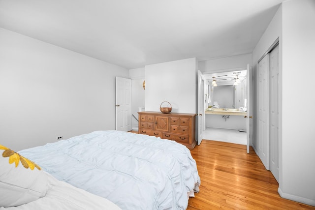 7N204 Eagle Ave, Medinah, IL 60157 - bedroom featuring light wood finished floors and ensuite bathroom