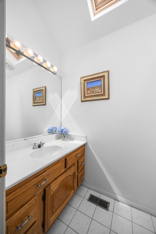 7N204 Eagle Ave, Medinah, IL 60157 - bathroom featuring vanity, tile patterned flooring, and vaulted ceiling