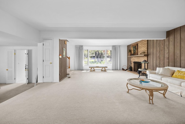 7N204 Eagle Ave, Medinah, IL 60157 - living area featuring carpet floors, a fireplace, and wooden walls