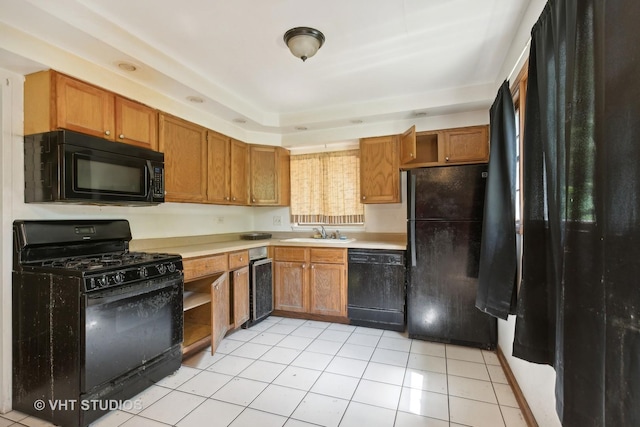 224 Shabbona Dr, Park Forest, IL 60466 - kitchen with black appliances, a sink, light tile patterned floors, light countertops, and brown cabinets