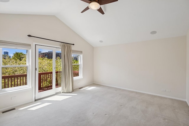 343 W Goethe St, Chicago, IL 60610 - spare room with ceiling fan, light carpet, lofted ceiling, and baseboards