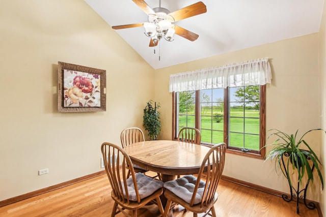 3840 W Nettle Creek Dr, Morris, IL 60450 - dining space with lofted ceiling, baseboards, light wood finished floors, and ceiling fan