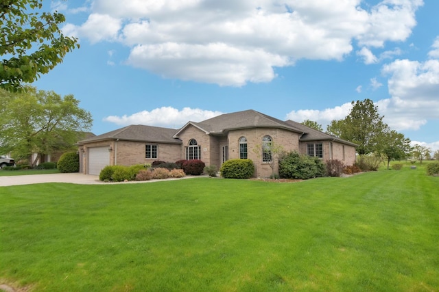 3840 W Nettle Creek Dr, Morris, IL 60450 - view of front facade featuring brick siding, driveway, a front yard, and a garage