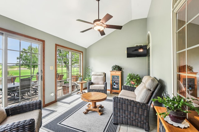 3840 W Nettle Creek Dr, Morris, IL 60450 - living room featuring ceiling fan, light tile patterned floors, baseboards, and high vaulted ceiling
