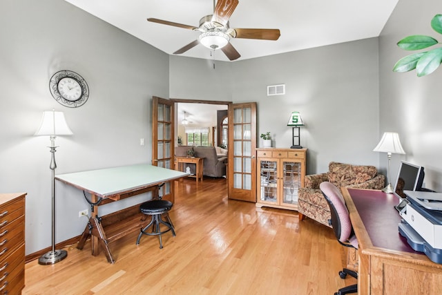 3840 W Nettle Creek Dr, Morris, IL 60450 - office space featuring french doors, light wood-style floors, a ceiling fan, vaulted ceiling, and baseboards