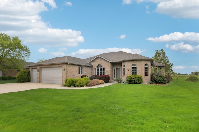 3840 W Nettle Creek Dr, Morris, IL 60450 - view of front of home with driveway, an attached garage, a front yard, and brick siding