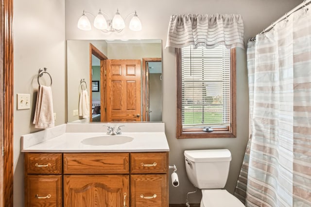 3840 W Nettle Creek Dr, Morris, IL 60450 - bathroom with toilet, vanity, and a shower with curtain