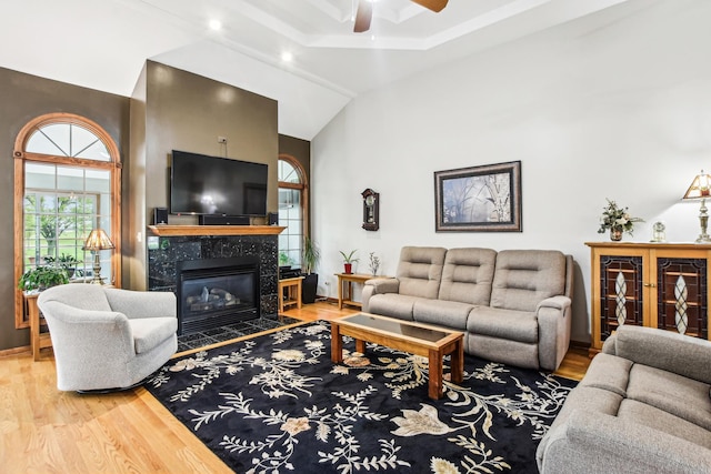 3840 W Nettle Creek Dr, Morris, IL 60450 - living area with wood finished floors, ceiling fan, a premium fireplace, high vaulted ceiling, and recessed lighting