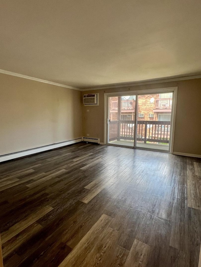 empty room with ornamental molding, dark wood-style floors, a baseboard heating unit, and baseboards