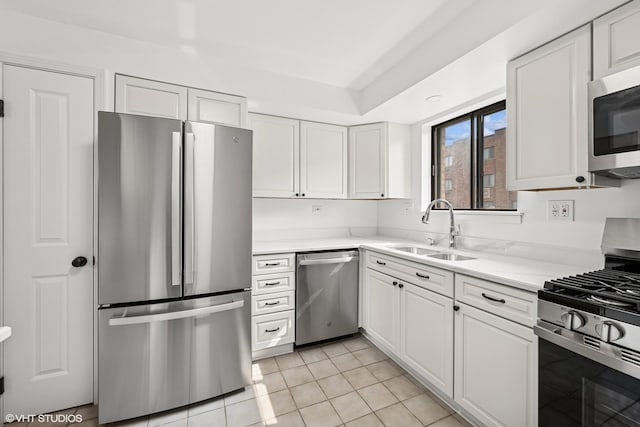 5327 N Delphia Ave Unit 327, Chicago, IL 60656 - kitchen featuring stainless steel appliances, white cabinetry, light countertops, and light tile patterned floors