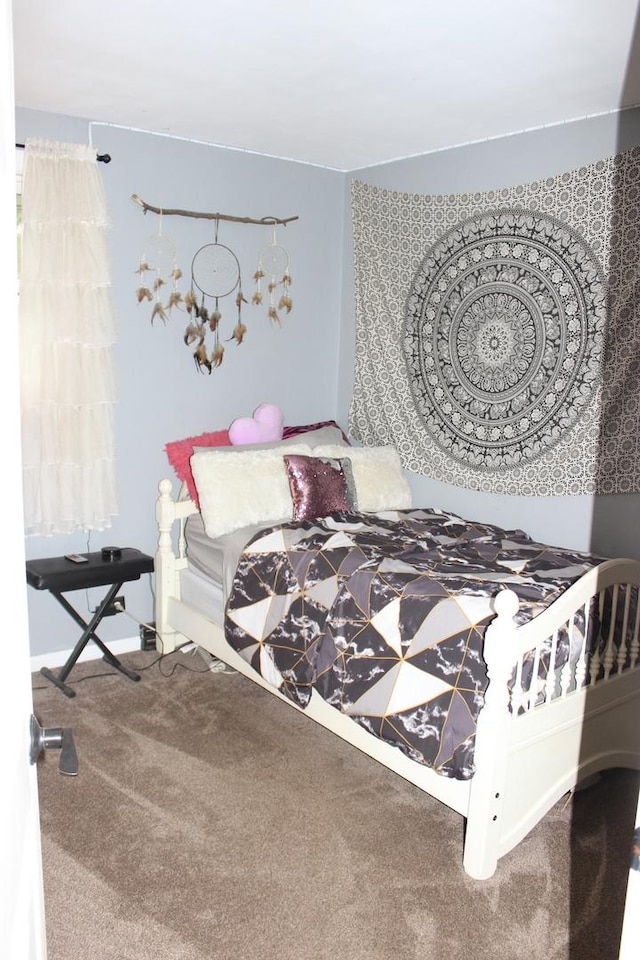 bedroom featuring carpet